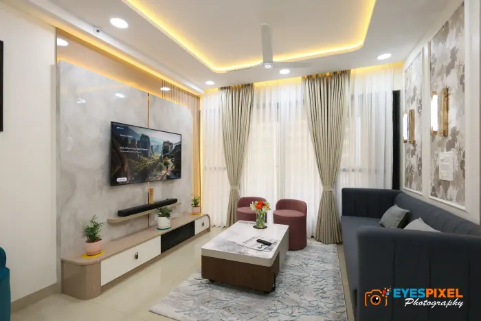 Television wall with a marble panel and a low storage unit below