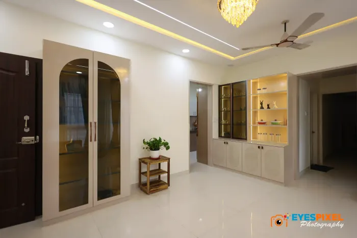 Passage between display cabinets, looking toward the bedroom doors