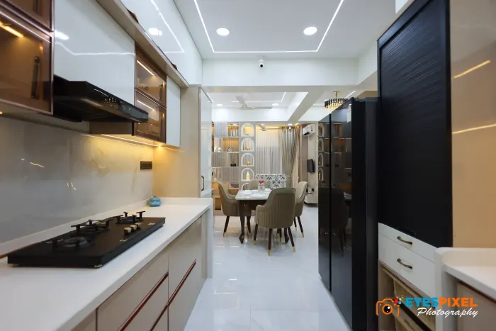 Kitchen counter and hob with the dining area visible beyond