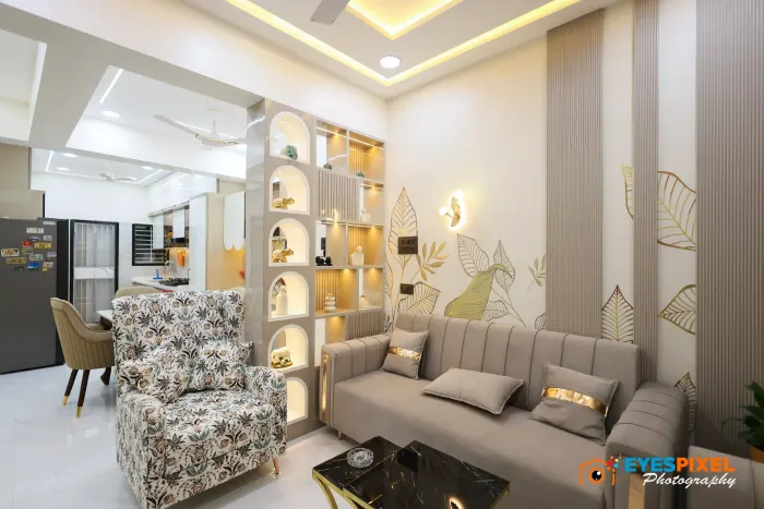 Wide living room view with arched niches running the length of one wall