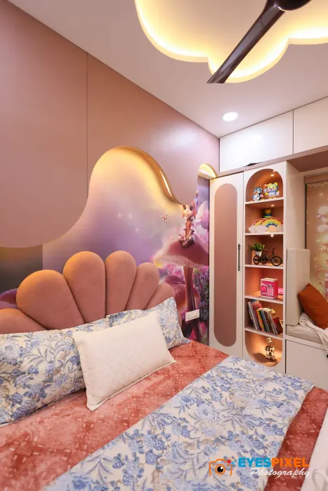 Scalloped upholstered headboard and bookshelf in a child’s bedroom
