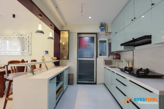 Kitchen and dining area seen together across an open ground floor